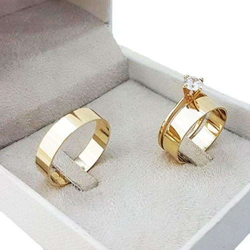 Qual o preço do(a)Par de Aliança em Ouro 18k 5mm Com Solitário Par de Aliança em Ouro 18k 5mm Com Solitário