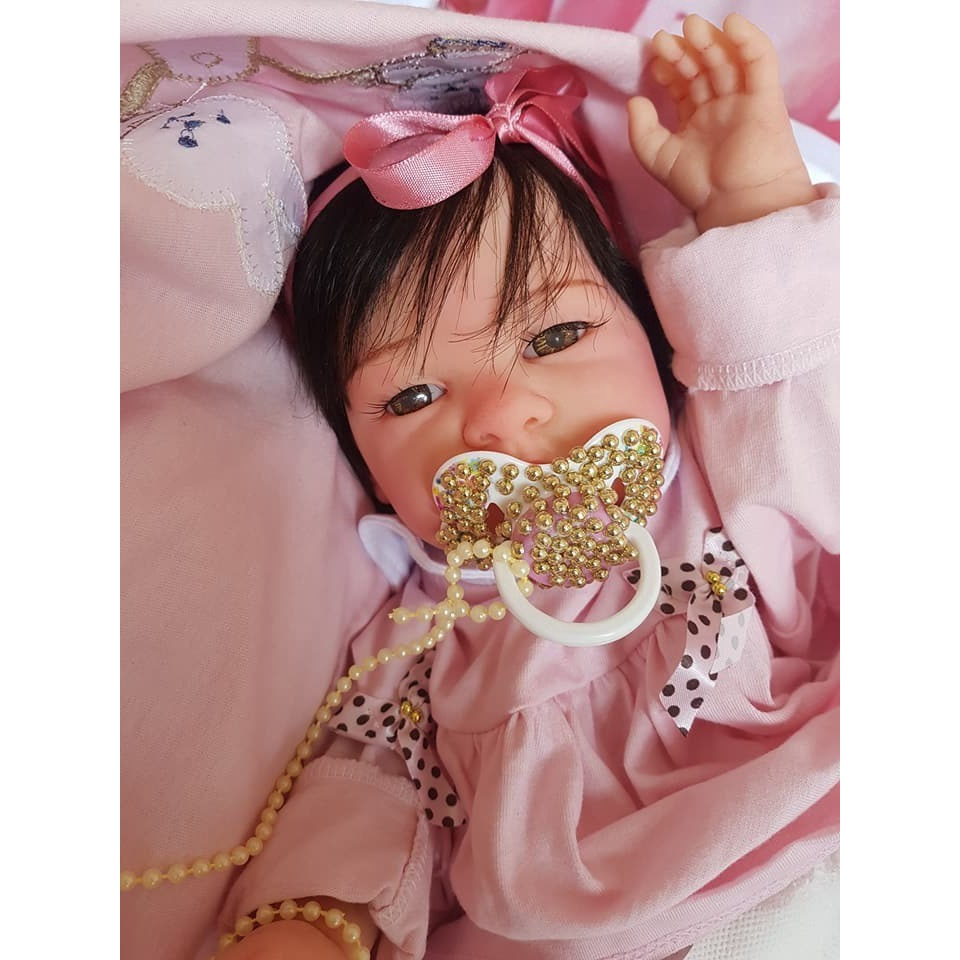 Boneca Bebê Reborn Laura Baby Milena 100% Vinil em Promoção na Americanas