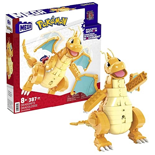 Uma figura de pokémon de ouro e preto com asas de ouro e asas de ouro.